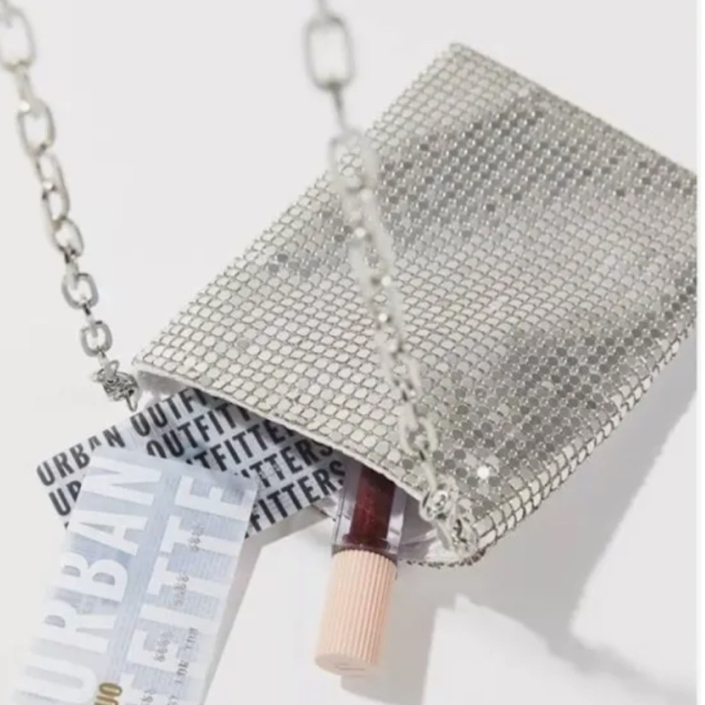 Urban Outfitters NWOT chain mesh purse . Silver crossbody with satin interior